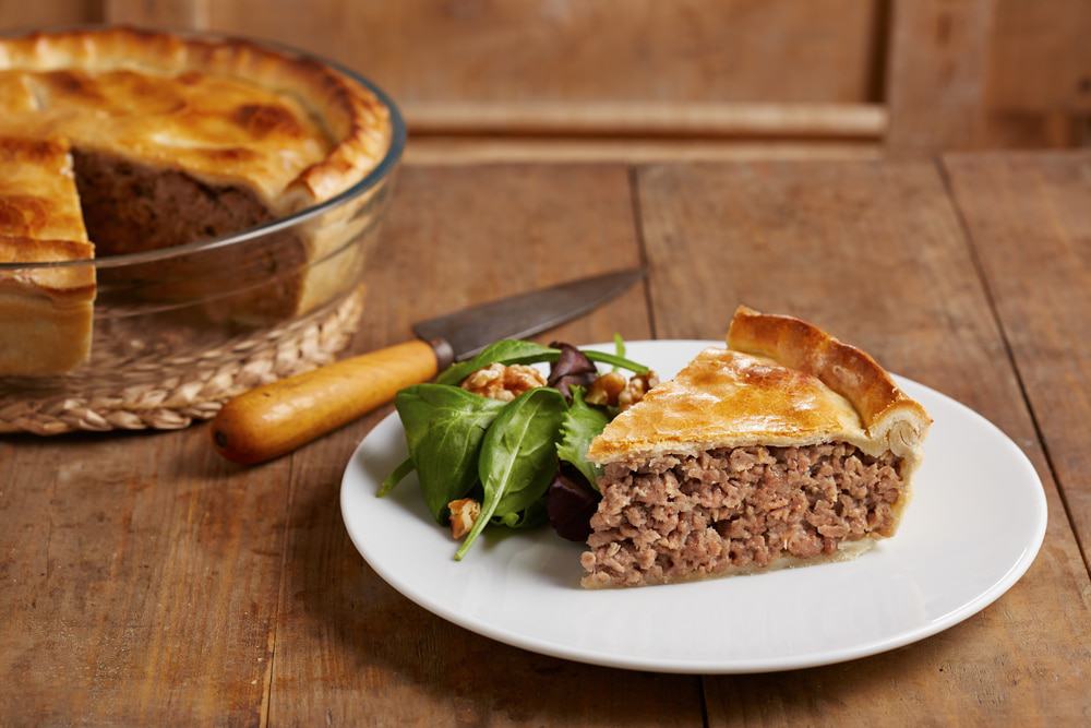 Tourtiere Canadian traditional meat pie on a dish