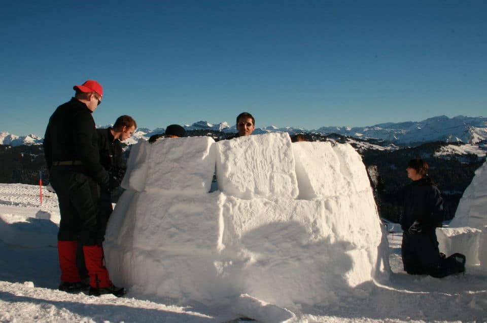Igloo Building With House-Warming Party