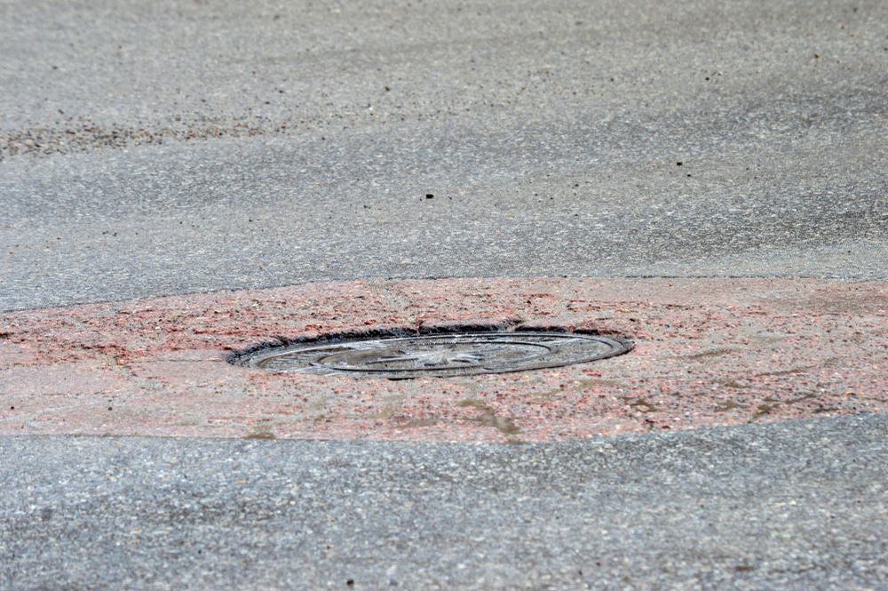 Center Of The Universe Manhole, Wallace