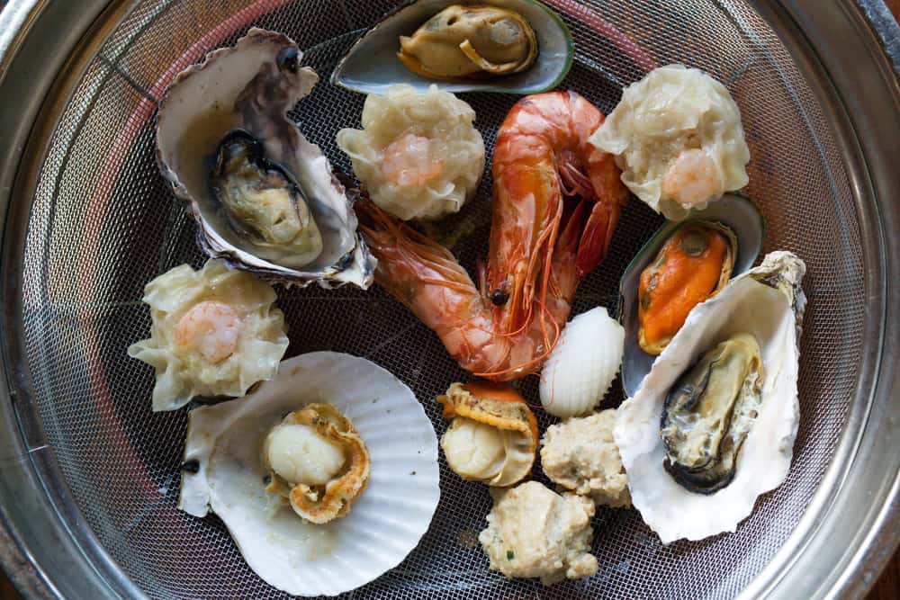 Steamed seafood over hot springs