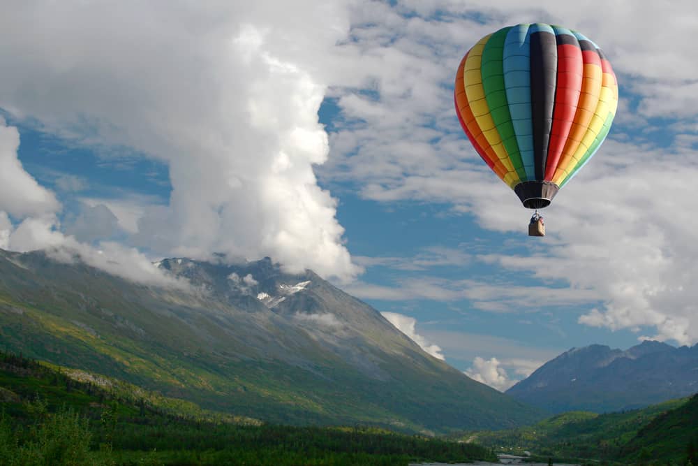 Hot Air Balloon Over Colorado Mountain Landscape